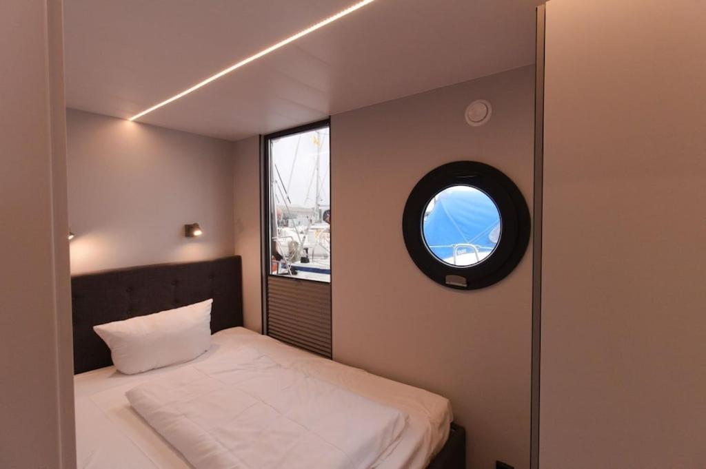Hausboot Fjord Meeresbrise Mit Dachterrasse In Flensburg Bagian luar foto