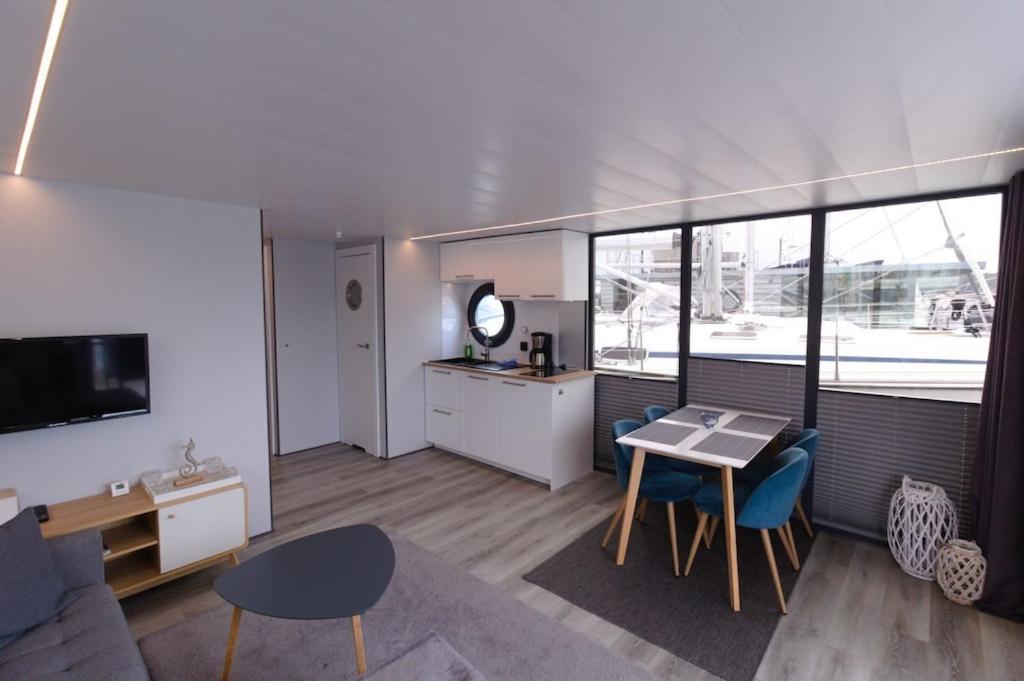 Hausboot Fjord Meeresbrise Mit Dachterrasse In Flensburg Bagian luar foto